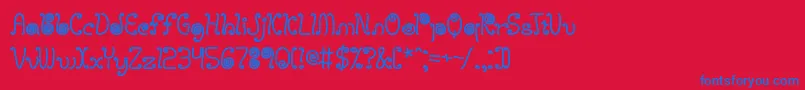 Czcionka LicoriceStringsBrk – niebieskie czcionki na czerwonym tle