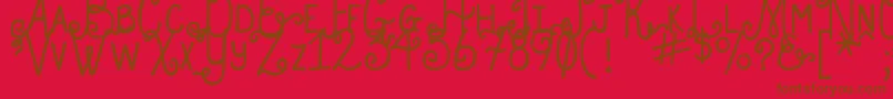 Fonte DjbHollyEnchanted – fontes marrons em um fundo vermelho