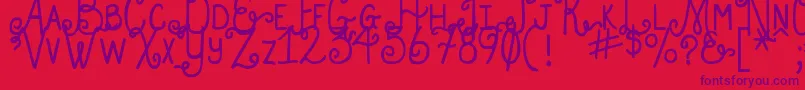 DjbHollyEnchanted-Schriftart – Violette Schriften auf rotem Hintergrund