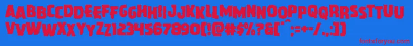Czcionka Howlinmadstag – czerwone czcionki na niebieskim tle