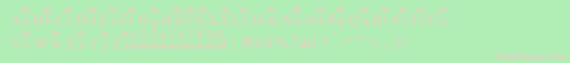 Ferretsrtopslowercase-fontti – vaaleanpunaiset fontit vihreällä taustalla