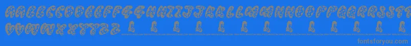 ThreadyBear-Schriftart – Graue Schriften auf blauem Hintergrund