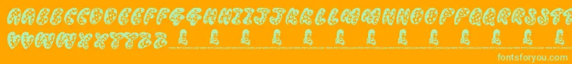 ThreadyBear-fontti – vihreät fontit oranssilla taustalla