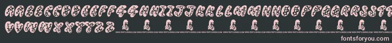 ThreadyBear-fontti – vaaleanpunaiset fontit mustalla taustalla