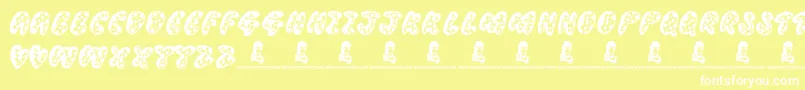 フォントThreadyBear – 黄色い背景に白い文字