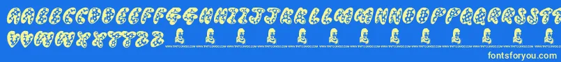 ThreadyBear-Schriftart – Gelbe Schriften auf blauem Hintergrund