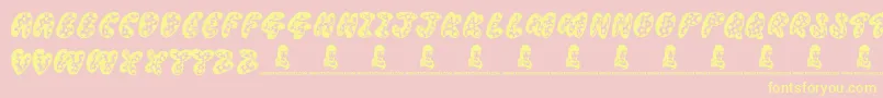 フォントThreadyBear – 黄色のフォント、ピンクの背景