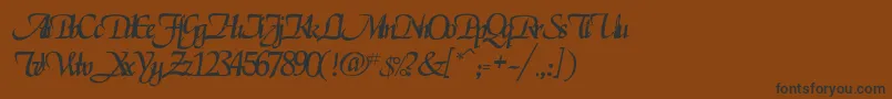 フォントRselgarrett – 黒い文字が茶色の背景にあります