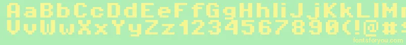 Pixeloperator8Bold-fontti – keltaiset fontit vihreällä taustalla