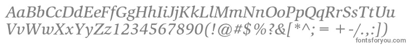 SlimbachstdMediumitalic-fontti – harmaat kirjasimet valkoisella taustalla