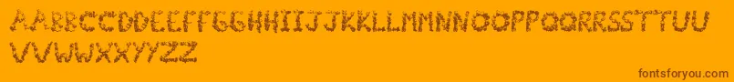 Popcornfont-Schriftart – Braune Schriften auf orangefarbenem Hintergrund