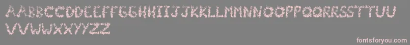 Popcornfont Font – Pink Fonts on Gray Background