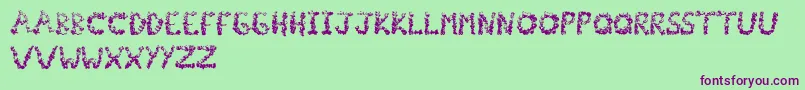 Popcornfont Font – Purple Fonts on Green Background