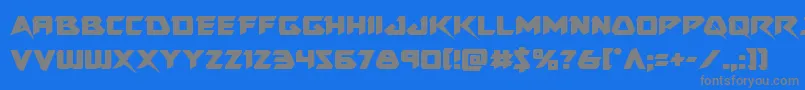 フォントSkirmisher – 青い背景に灰色の文字