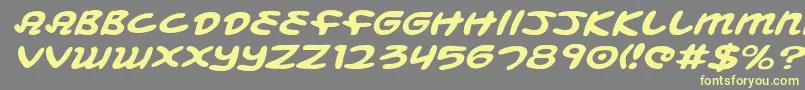 MagicBeansExpandedItalic-Schriftart – Gelbe Schriften auf grauem Hintergrund