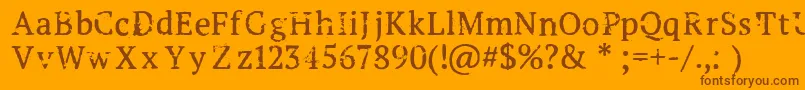 Creepshow Font – Brown Fonts on Orange Background