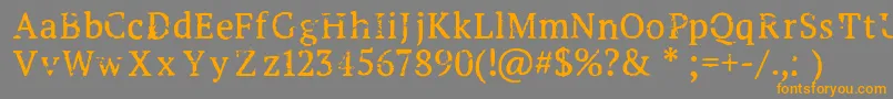 Creepshow Font – Orange Fonts on Gray Background