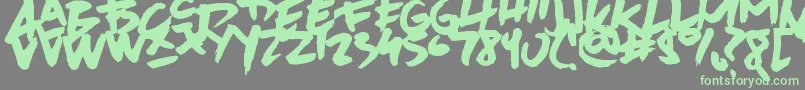 AvenueDrift-Schriftart – Grüne Schriften auf grauem Hintergrund