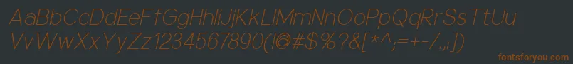 Fonte NuorderLightitalic – fontes marrons em um fundo preto
