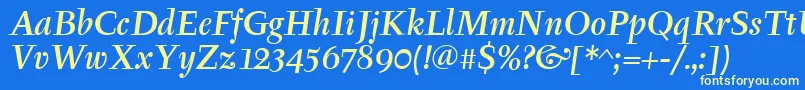 TyfamditcTtРљСѓСЂСЃРёРІ Font – Yellow Fonts on Blue Background