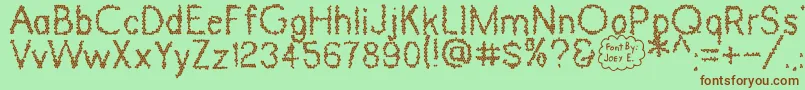 DinosaurSkin Font – Brown Fonts on Green Background