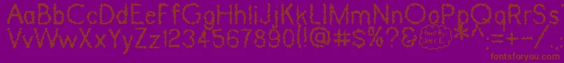 DinosaurSkin Font – Brown Fonts on Purple Background