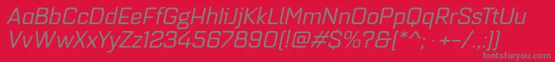 フォントQuarcaextregularitalic – 赤い背景に灰色の文字