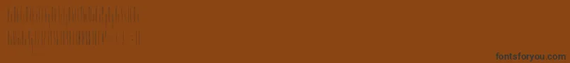 Czcionka Slendergreyregular – czarne czcionki na brązowym tle
