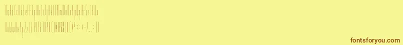 フォントSlendergreyregular – 茶色の文字が黄色の背景にあります。