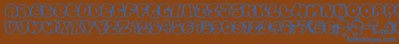 Touristtrap Font – Blue Fonts on Brown Background