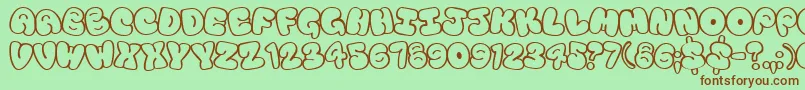 Touristtrap Font – Brown Fonts on Green Background