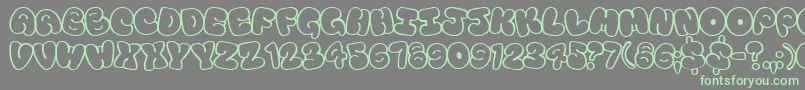 Touristtrap Font – Green Fonts on Gray Background
