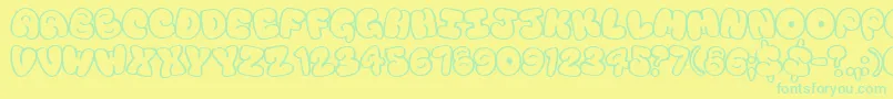 Touristtrap Font – Green Fonts on Yellow Background