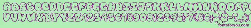 Touristtrap Font – Purple Fonts on Green Background