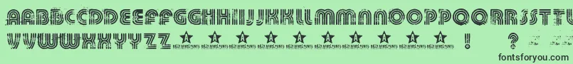 フォントKilleddj – 緑の背景に黒い文字