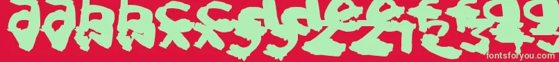 SplatBrush-Schriftart – Grüne Schriften auf rotem Hintergrund