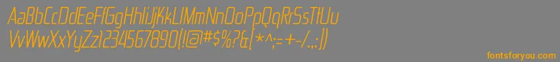 フォントZektoncdltItalic – オレンジの文字は灰色の背景にあります。