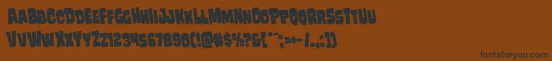 Mindlessbruterotate Font – Black Fonts on Brown Background