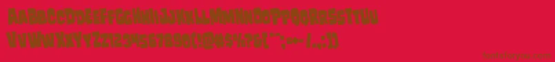 Fonte Mindlessbruterotate – fontes marrons em um fundo vermelho