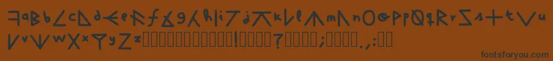 フォントFuckTheWhat – 黒い文字が茶色の背景にあります