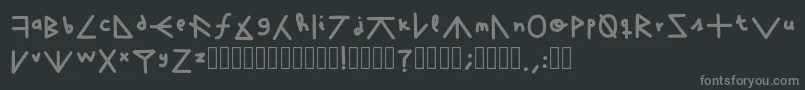 フォントFuckTheWhat – 黒い背景に灰色の文字