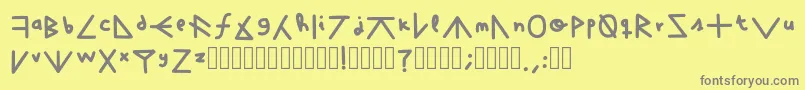 フォントFuckTheWhat – 黄色の背景に灰色の文字