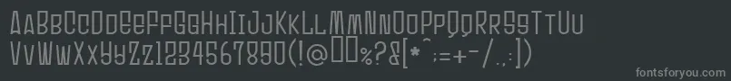 フォントUltrasonik – 黒い背景に灰色の文字