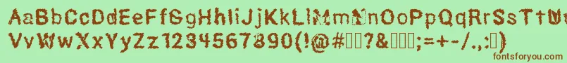 Hexoto Font – Brown Fonts on Green Background