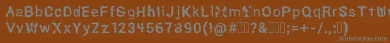 Hexoto Font – Gray Fonts on Brown Background