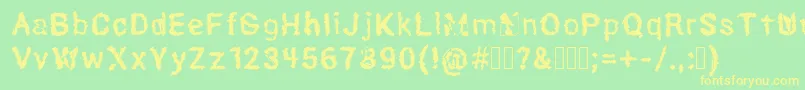 Hexoto Font – Yellow Fonts on Green Background