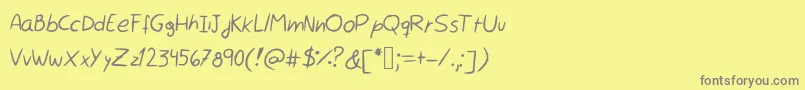 フォントRocchySHandwriting – 黄色の背景に灰色の文字