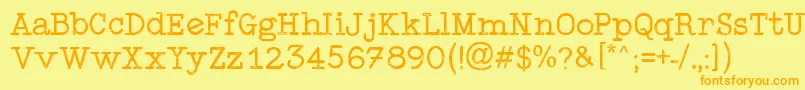 フォントTypewriterStyle – オレンジの文字が黄色の背景にあります。