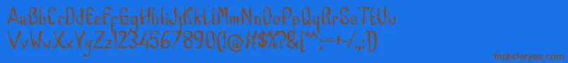 CabogeFontByOmus7ntypes-Schriftart – Braune Schriften auf blauem Hintergrund