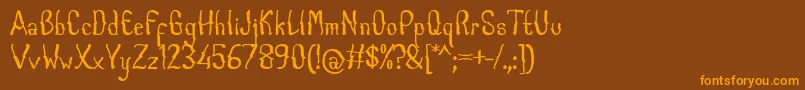 CabogeFontByOmus7ntypes Font – Orange Fonts on Brown Background